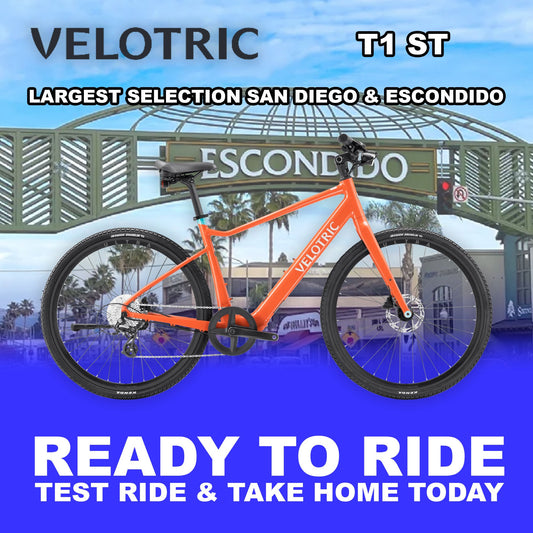 Electric bike Velotric T1 ST in Lava color, side view, fully assembled and ready to ride, against a plain background.