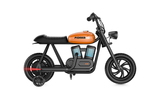 Orange eMOTO Hyper Gogo Pioneer 12 Plus electric bike with training wheels, side view