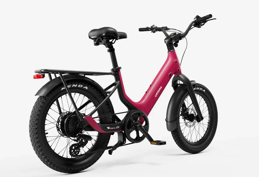 Side view of the Urtopia Carbon Joy eBike in a studio setting, showcasing its lightweight carbon frame, sleek design, and integrated battery.