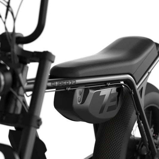 Super73 Z Miami SE electric bike in Astro Blackout color, side view, black frame with minimalist design, photographed on a white background.
