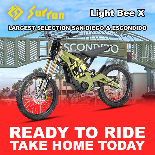 Green eMOTO Surron Light Bee X electric bike, side view, ready to ride, product image