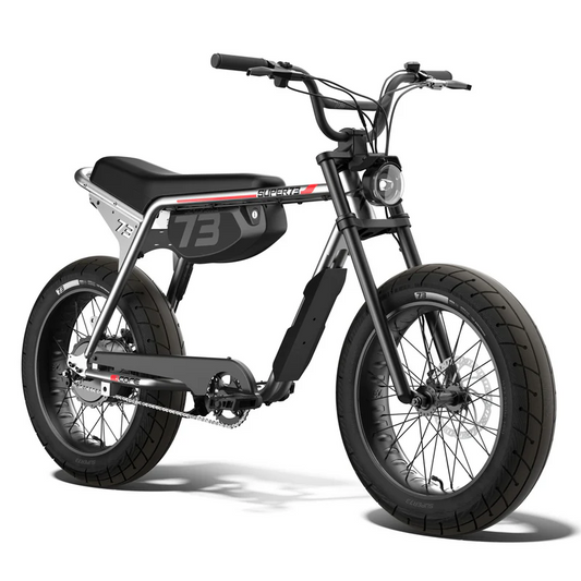Side view of the Super73 ZX Core Legacy Series eBike in metallic aluminum, showcasing its frame, wheels, and handlebars against a plain background.
