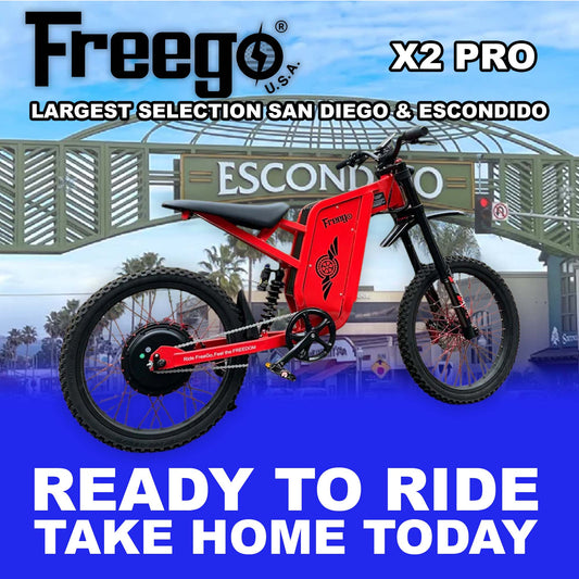 Red eMOTO Freego X2 Pro electric scooter, side view, ready to ride, against a plain background
