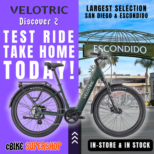 Velotric Discover 2 eBike in Pine Green, shown in its box with product packaging, model R2R Green