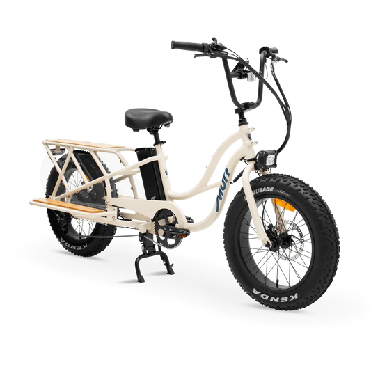 Bone-colored MURF Higgs Cargo fat tire eBike side view, showcasing sturdy frame, large tires, and rear cargo rack.