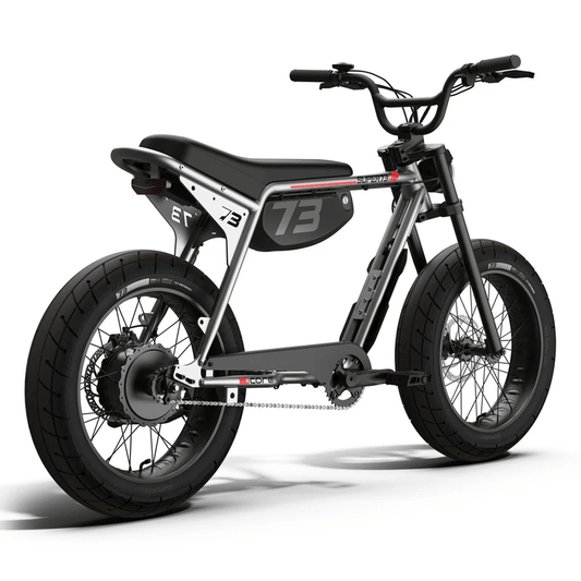 Side view of the Super73 ZX Core Legacy Series eBike in metallic aluminum, showcasing its frame, wheels, and minimalist design against a plain background.