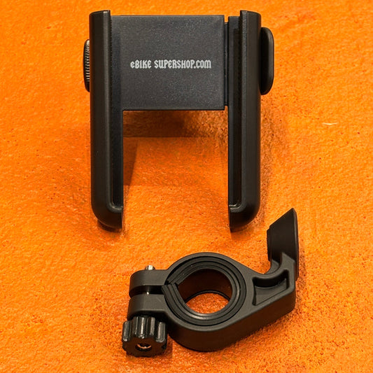 A black eBike phone mount securely attached to a bicycle handlebar, holding a smartphone in place.