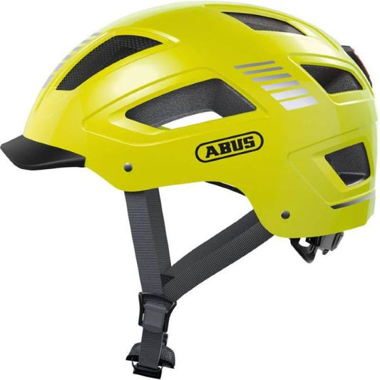 A yellow Hyban 2.0 medium eBike helmet displayed in-store.