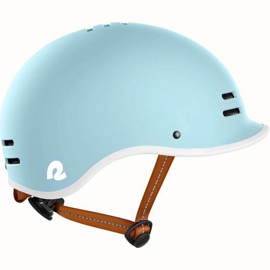 Matte cool mint Retrospec Remi eBike helmet, side view, with adjustable straps and ventilation holes