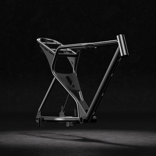 A black Macfox X1S electric bike parked outdoors, showcasing its sturdy frame, thick tires, and modern design.
