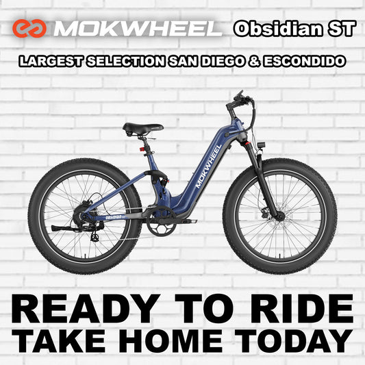 Electric bike Mokwheel Obsidian ST in blue and grey, side view, against a white background.