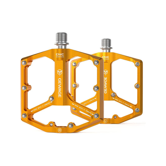Orange alloy eBike pedals with textured surface, shown in product image on white background.