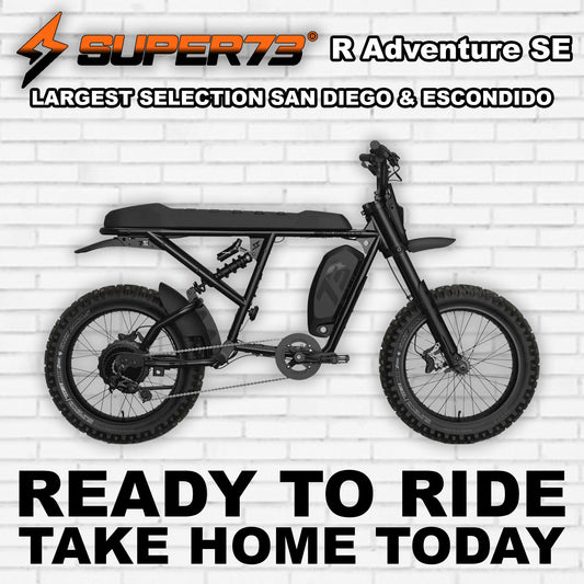 Super73 R Adventure electric bike in Blackout color, side view, rugged tires, and sporty frame design