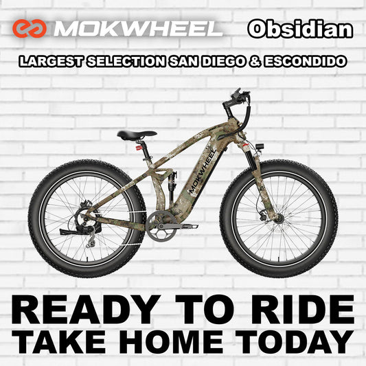 Mokwheel Obsidian eBike in Jungle Camo color, side view, displayed outdoors