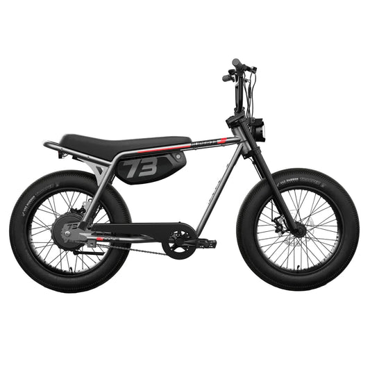 Side view of the Emoto Ebike Super73 Z Miami Core in black, displayed in a showroom setting, highlighting its sleek frame and thick tires.