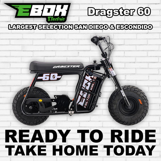 Black eMOTO Ebox Dragster 60 electric bike, side view, against a white background