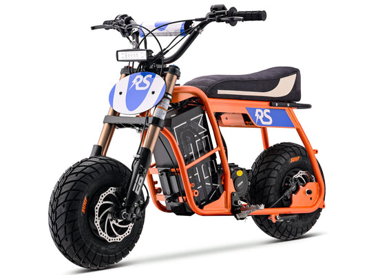 eMOTO Stomp Ebox Dragster RS electric bike in orange, shown in its box