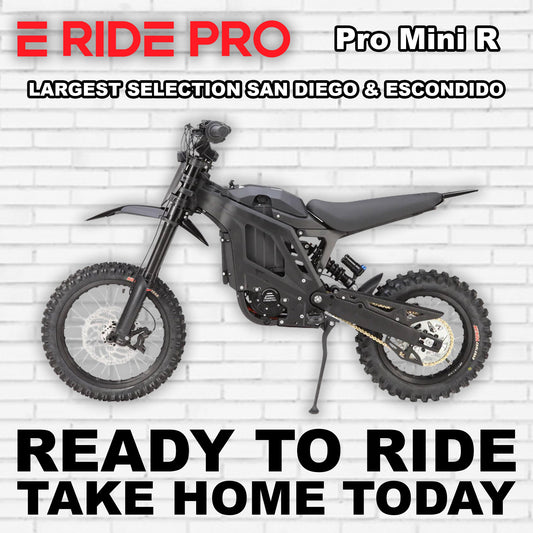 Black eMOTO eRide Pro Mini R electric dirt bike, side view, on white background