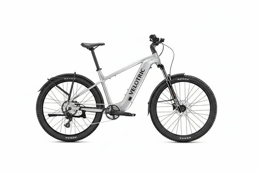 A black Velotric Summit 2 eBike shown from the side, featuring a sturdy frame, front suspension fork, wide tires, and integrated battery.