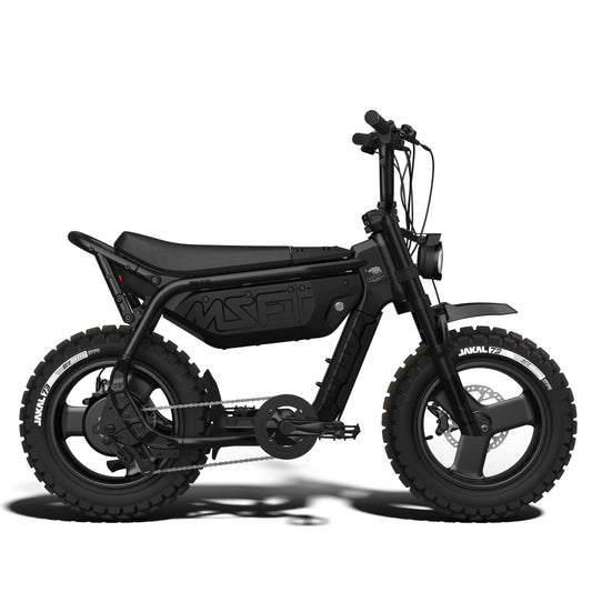 Super73 MZFT SE eMOTO eBike in Blackout color, shown inside its original box with packaging materials.