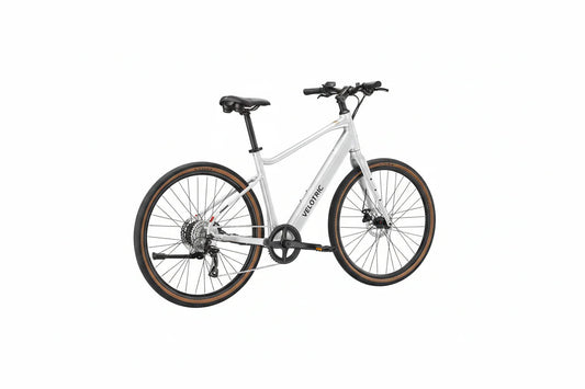 Side view of the Velotric Tempo eBike in a studio setting, showcasing its step-through frame, integrated battery, and upright handlebars.