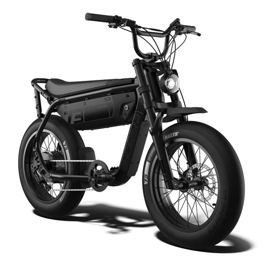 Super73 M1D SE eMOTO eBike in Blackout color, shown inside its original packaging box with protective materials.
