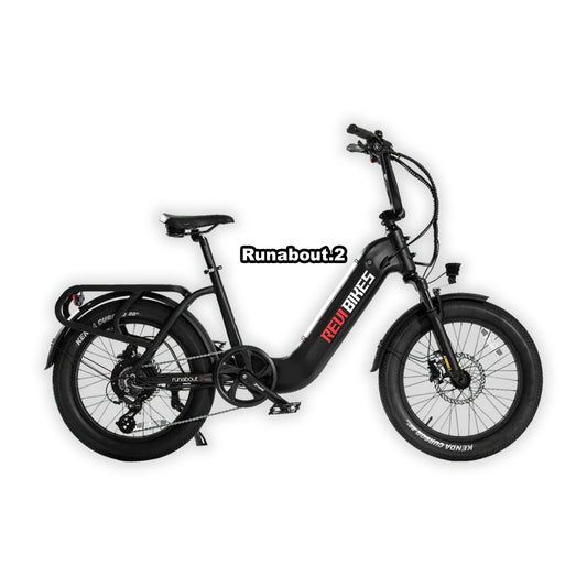 Black eBike Revi Runabout.2 in box, product image showing packaged bicycle