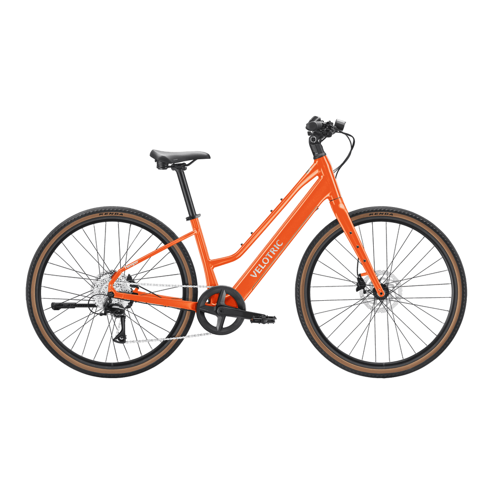 Velotric Tempo Mid Step eBike in Sunset Tangerine color, side view, against a plain background.