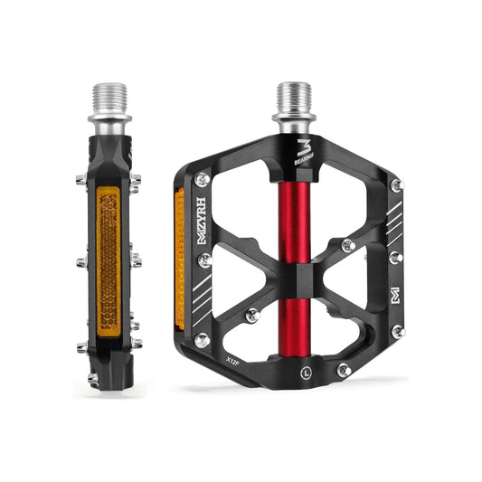 Black and red alloy eBike pedals with built-in reflectors, shown from a side angle.