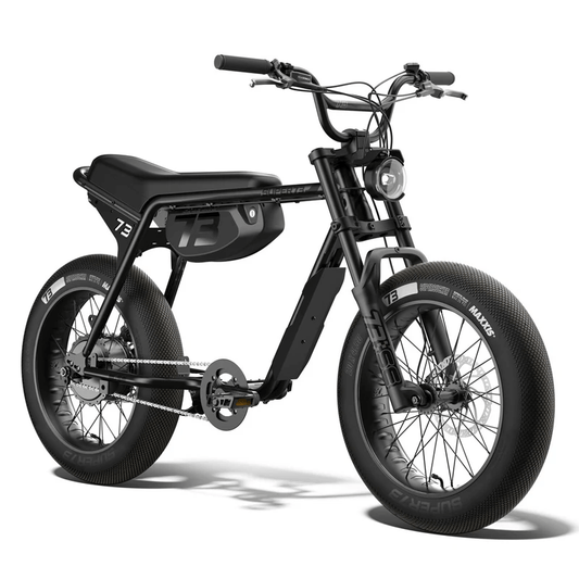Side view of a black Super73 ZX SE electric bike with thick tires, minimalist frame, and a long seat, photographed against a plain white background.