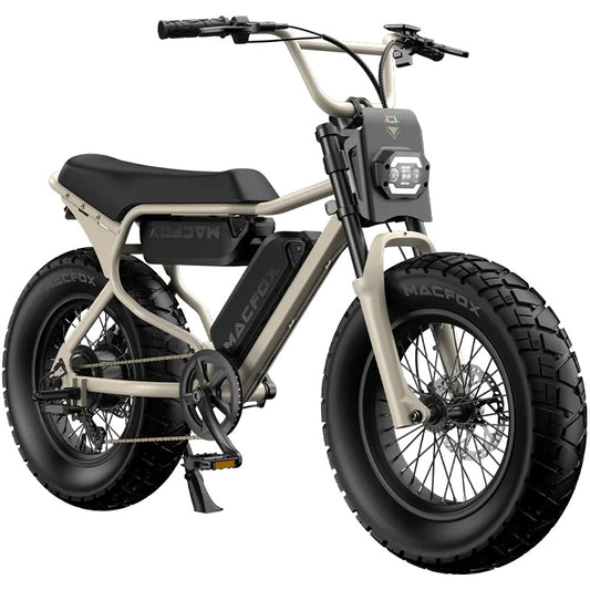 Macfox X7 eBike in dual desert beige color, side view, parked on sandy terrain