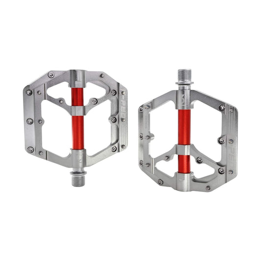 Silver and red alloy bicycle pedals with reflectors, shown in product image.