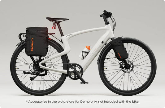 Side view of the Urtopia Carbon 1 Pro eBike showcasing its sleek black carbon fiber frame, integrated battery, and minimalist design against a white background.
