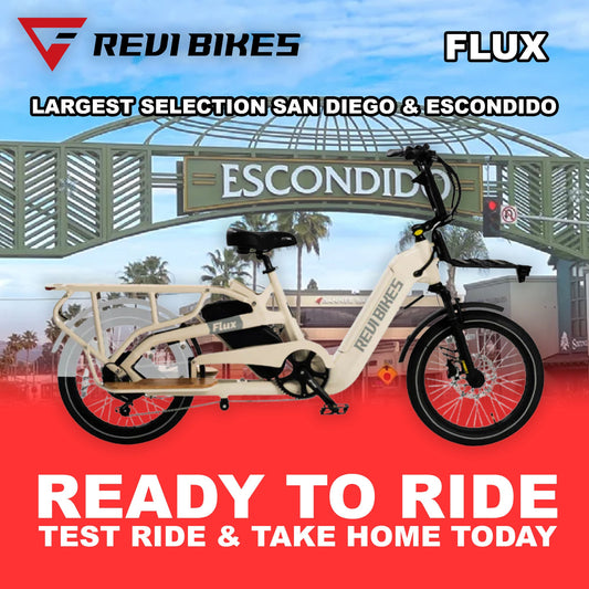Cream-colored eBike Revi Flux model R2R shown from a side angle, highlighting its sleek frame, battery integration, and modern design.