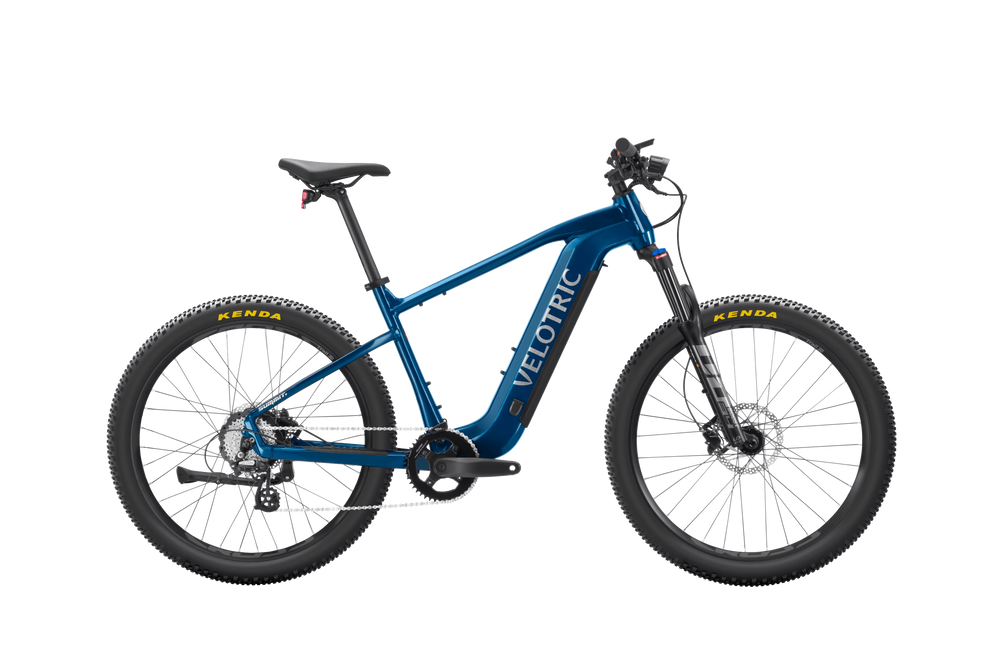 Royal blue Velotric Summit 1 eBike side view against a white background