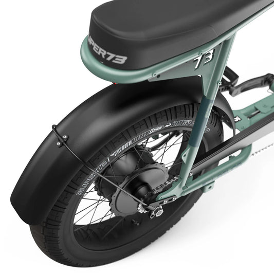 Side view of the Super73 S2 Laguna electric bike in a studio setting, showcasing its sleek frame, large tires, and minimalist design.