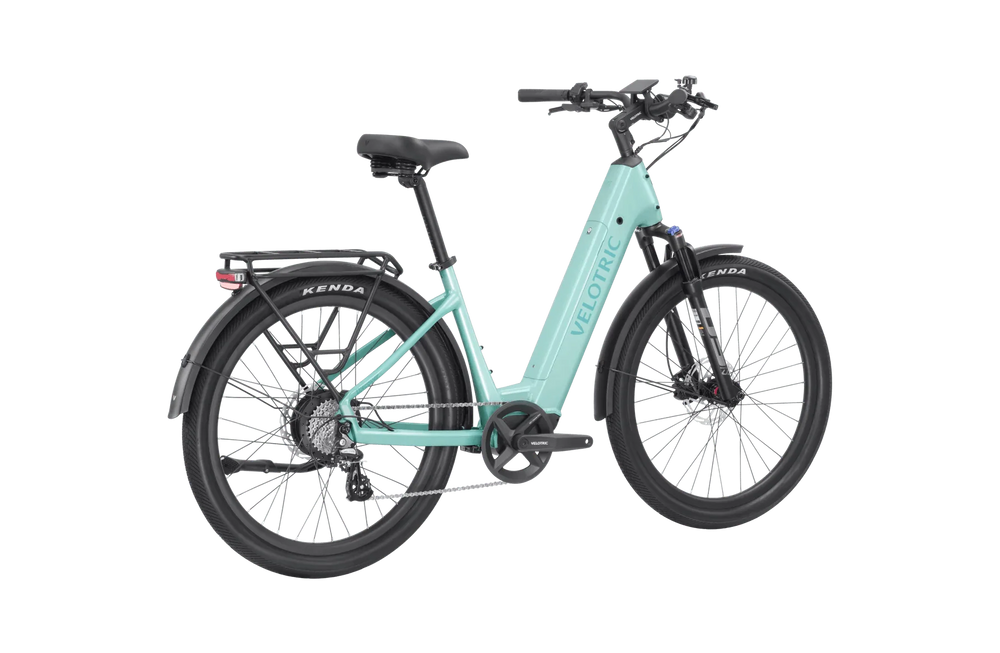 Mint green Velotric Discover 2 eBike in original box, product image showing bike packaging and branding.