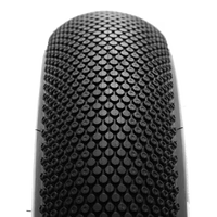 Close-up view of a Maxis SuperSucker 20x4.5 fat eBike tire showing deep tread pattern and sidewall branding.