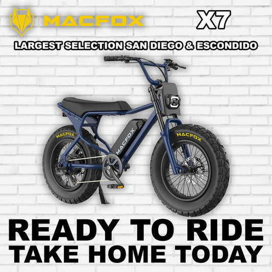 Navy blue Macfox X7 eBike side view with rugged tires and sleek frame design