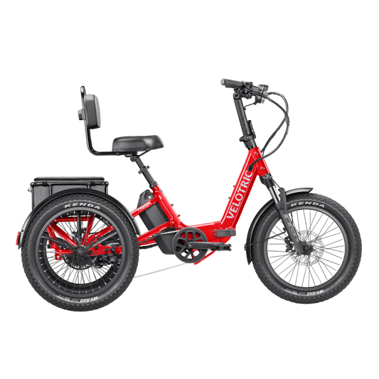Velotric Triker eTrike in Cherry Crimson color, side view, showcasing three wheels and modern design.