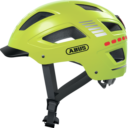 Yellow Abus Hyban 2.0 LED eBike helmet, size large, displayed in-store with visible LED light and ventilation openings.