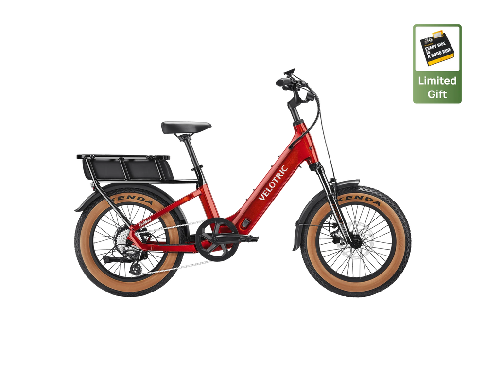 Velotric GoMad eBike in Dark Amber color, side view, showcasing its sturdy frame, thick tires, and integrated battery design.