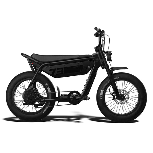 Super73 M1D SE eMOTO eBike in Blackout color, shown in its original box with packaging materials.