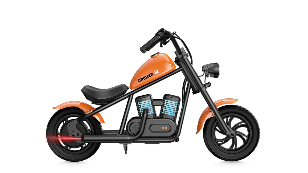 Orange eMOTO Hyper Gogo Cruiser 12 Plus electric bike, side view, showing sturdy frame, thick tires, and modern design features.