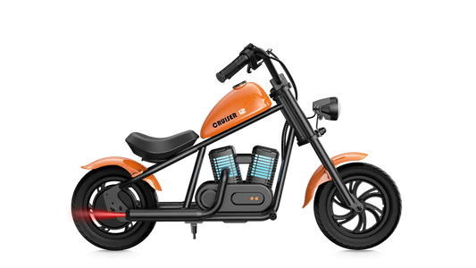 Orange eMOTO Hyper Gogo Cruiser 12 Plus electric bike, side view, showing sturdy frame, thick tires, and modern design features.