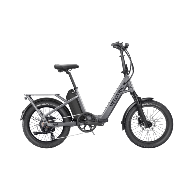 Velotric Fold 1 Plus eBike in Stone Gray, side view, folded compactly for portability
