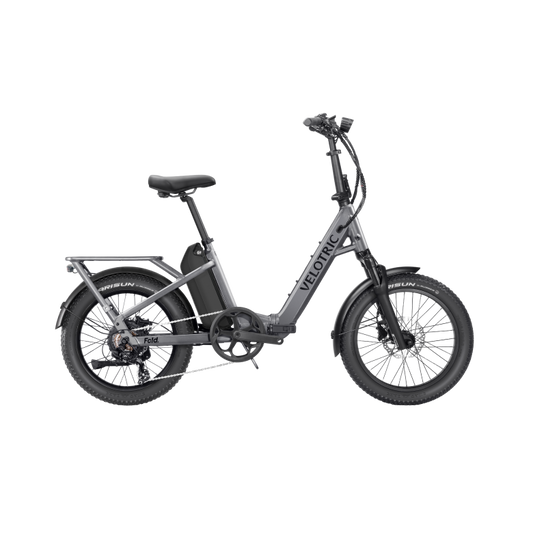 Velotric Fold 1 Plus eBike in Stone Gray, side view, folded compactly for portability