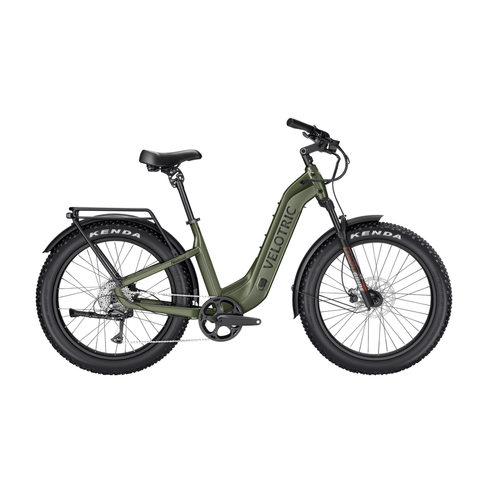 Olive green Velotric Nomad 2 electric bike side view with fat tires and rear rack