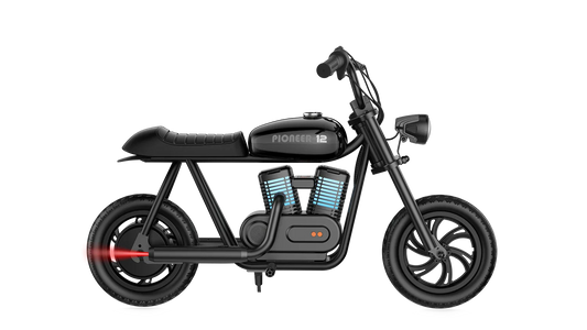 Black eMOTO Hyper Gogo Pioneer 12 Plus electric bike without training wheels, side view on white background
