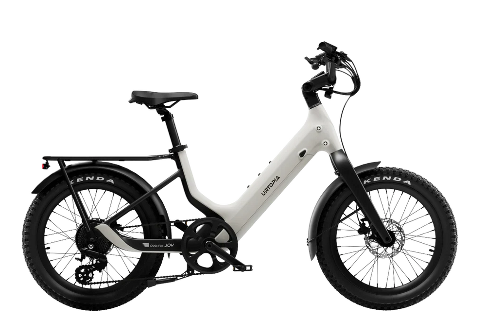 Urtopia Carbon Joy Ultra eBike in creme color, side view, showcasing lightweight carbon frame and modern design.